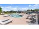 Inviting community pool area with lounge chairs, perfect for relaxation and enjoying sunny days at 2539 Sagebrush Trl, Buford, GA 30519