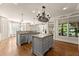 Bright kitchen with island, stainless appliances, and granite counters for gourmet cooking at 2539 Sagebrush Trl, Buford, GA 30519
