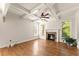 Bright living room with coffered ceilings, fireplace and hardwood flooring at 2539 Sagebrush Trl, Buford, GA 30519
