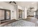 Expansive screened porch with wooded views, featuring wooden floors at 2539 Sagebrush Trl, Buford, GA 30519