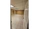 Spacious finished basement features tile flooring and recessed lighting at 312 N Briar Rdg, Woodstock, GA 30189