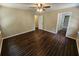 Spacious main bedroom featuring hardwood floors, ceiling fan and ensuite bathroom at 312 N Briar Rdg, Woodstock, GA 30189