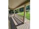 Covered front porch offers a relaxing outdoor space at 312 N Briar Rdg, Woodstock, GA 30189