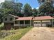 Charming two-story house featuring a two-car garage and front porch at 504 Tracy Ct, Lawrenceville, GA 30046