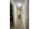 Bright hallway with carpeted stairs and fresh paint throughout at 504 Tracy Ct, Lawrenceville, GA 30046