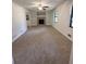 Spacious living room features a fireplace, built-in bookshelves, fresh paint, and ample natural light at 504 Tracy Ct, Lawrenceville, GA 30046