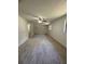 Bright living room with ample natural light and neutral carpeting at 504 Tracy Ct, Lawrenceville, GA 30046