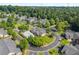 Scenic aerial view highlighting the community's layout, pool area, and lush landscaping at 5228 Stone Village Circle Northwest #14 Nw Cir # 14, Kennesaw, GA 30152