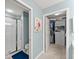 Ensuite bathroom with walk-in shower and a spacious walk-in closet at 5228 Stone Village Circle Northwest #14 Nw Cir # 14, Kennesaw, GA 30152