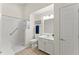 Clean bathroom with a walk-in shower, updated vanity, and neutral color scheme at 5228 Stone Village Circle Northwest #14 Nw Cir # 14, Kennesaw, GA 30152
