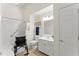 Accessible bathroom featuring a walk-in shower, grab bars, and comfort-height toilet at 5228 Stone Village Circle Northwest #14 Nw Cir # 14, Kennesaw, GA 30152