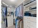 Spacious walk-in closet with custom shelving and ample storage space for clothes and accessories at 5228 Stone Village Circle Northwest #14 Nw Cir # 14, Kennesaw, GA 30152