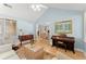 Inviting living room with vaulted ceilings, lots of light, a piano and comfortable seating at 5228 Stone Village Circle Northwest #14 Nw Cir # 14, Kennesaw, GA 30152