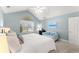 Inviting bedroom features a ceiling fan, sitting area, and ample natural light at 5228 Stone Village Circle Northwest #14 Nw Cir # 14, Kennesaw, GA 30152