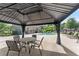 Community pool features covered seating, lounge chairs and tables for relaxing at 5228 Stone Village Circle Northwest #14 Nw Cir # 14, Kennesaw, GA 30152