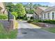 Scenic street view showcasing well-maintained homes, landscaping, and inviting neighborhood at 5228 Stone Village Circle Northwest #14 Nw Cir # 14, Kennesaw, GA 30152