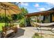 Backyard features patio, dining, seating and yard space perfect for entertaining and relaxing at 110 Village Ct, Woodstock, GA 30188