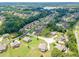 Aerial image highlighting a neighborhood with well-maintained homes and lush landscaping at 1405 Rainey Way, Hampton, GA 30228