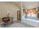 Bright bathroom includes a standalone tub, separate shower, and tiled floors at 1405 Rainey Way, Hampton, GA 30228