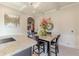 Elegant dining area featuring a marble table, chandelier, and beautiful decorative accents at 1405 Rainey Way, Hampton, GA 30228