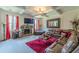 Comfortable living room with a cozy fireplace and coffered ceilings at 1405 Rainey Way, Hampton, GA 30228