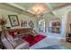 Well-appointed living room with an archway view to the kitchen and elegant furnishings at 1405 Rainey Way, Hampton, GA 30228