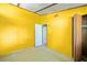 View of the yellow bedroom featuring a closet, and door to another room at 4235 Apache Se Dr, Acworth, GA 30102