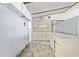 View of the kitchen featuring wood-look flooring, cabinetry, and an island at 4235 Apache Se Dr, Acworth, GA 30102