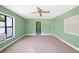 Living room with green walls, windows, and door to another room at 4235 Apache Se Dr, Acworth, GA 30102