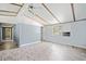 Living room with new flooring, ceiling fan and view to the front yard at 4235 Apache Se Dr, Acworth, GA 30102