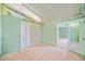 Room view featuring a door to another room and ample lighting at 4235 Apache Se Dr, Acworth, GA 30102