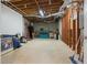 Unfinished basement with exposed ceiling, concrete floor, and wooden support beams for versatile use at 6685 Driskell Rd, Cumming, GA 30041