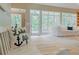 Inviting entryway featuring a bench and views of the living area at 6685 Driskell Rd, Cumming, GA 30041
