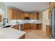 Well-appointed kitchen with stainless appliances, granite countertops, and bright lighting fixtures at 6685 Driskell Rd, Cumming, GA 30041