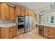 Well-equipped kitchen with stainless steel appliances and ample storage, perfect for cooking and entertaining at 6685 Driskell Rd, Cumming, GA 30041