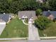 An elevated view highlights the home, its manicured lawn, and neighborhood setting at 964 Natural Brook Trl, Lawrenceville, GA 30045