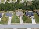 A neighborhood view displays the home's location among tree-lined streets and nearby houses at 964 Natural Brook Trl, Lawrenceville, GA 30045