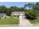 Charming home with a well-manicured lawn and a two-car garage at 964 Natural Brook Trl, Lawrenceville, GA 30045