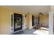 Welcoming front porch featuring comfortable seating and a decorative wreath on the front door at 964 Natural Brook Trl, Lawrenceville, GA 30045