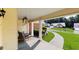 Inviting covered front porch with seating, offering a relaxing outdoor space with a view of the neighborhood at 964 Natural Brook Trl, Lawrenceville, GA 30045
