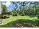 Expansive backyard, showcasing a fire pit and trampoline, ideal for outdoor recreation and relaxation at 20 Scarlett Oak Ne Dr, Cartersville, GA 30121