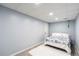 Bedroom with blue walls, white carpet, recessed lights and a bed at 20 Scarlett Oak Ne Dr, Cartersville, GA 30121