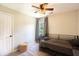 Neutral bedroom with a carpet, a black metal bedframe, ceiling fan and a window at 20 Scarlett Oak Ne Dr, Cartersville, GA 30121