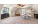 Spacious bonus room featuring a table, chairs and lots of windows at 20 Scarlett Oak Ne Dr, Cartersville, GA 30121