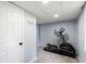 Exercise room with grey walls, tiled floor, and exercise equipment at 20 Scarlett Oak Ne Dr, Cartersville, GA 30121