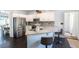 Modern kitchen featuring white cabinets, stainless steel appliances, and granite countertops at 20 Scarlett Oak Ne Dr, Cartersville, GA 30121
