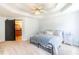 Large main bedroom with barn door entrance to ensuite bathroom and carpet at 20 Scarlett Oak Ne Dr, Cartersville, GA 30121
