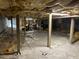 Unfinished basement featuring vapor barrier on the ground and visible beams and insulation at 200 Chaparral Trce, Tyrone, GA 30290