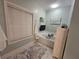 Bright bathroom with a luxurious soaking tub, a mounted TV, and a serene ambiance at 200 Chaparral Trce, Tyrone, GA 30290