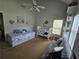 Bedroom room features a daybed, baby crib, and is complete with soothing neutral tones and ample natural light at 200 Chaparral Trce, Tyrone, GA 30290